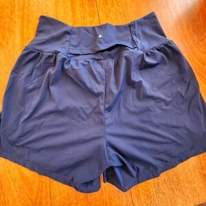 Halara Women's High Waist Softly Yoga Shorts Double Layer W/ Pockets Underneath.